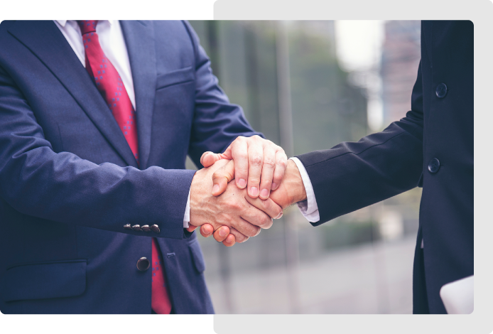 Two business partners shaking hands