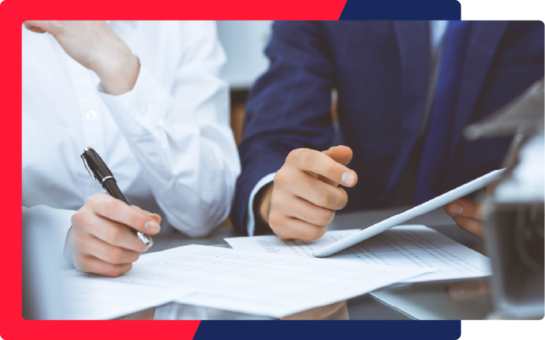 two lawyers reviewing their cases paperwork